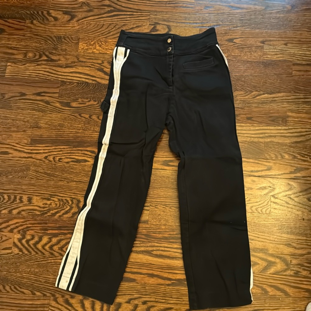 Black jeans with a white stripe